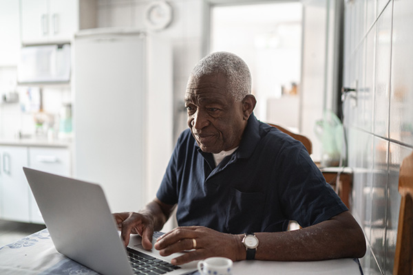 An investor on his laptop