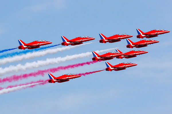 Red Arrows display team with colourful smoke trails