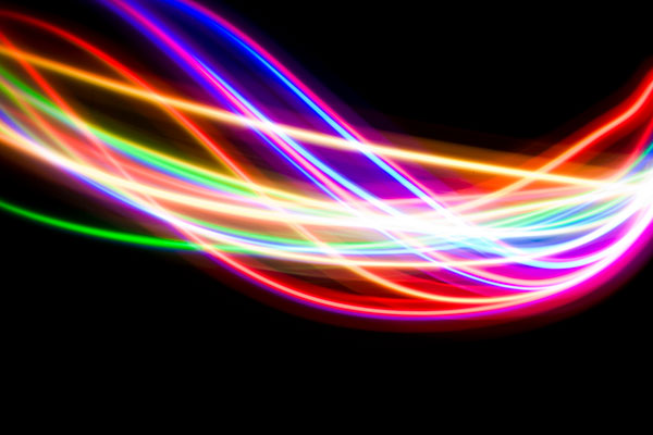 Colourful wires against a black background