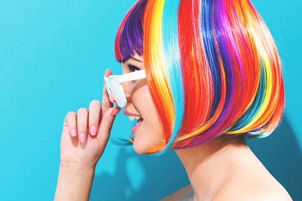A female investor with rainbow hair