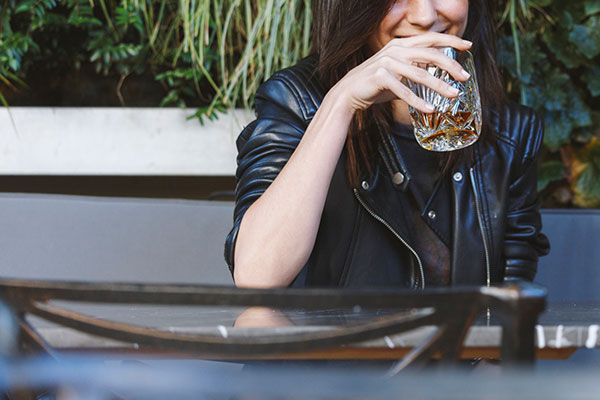 Woman drinking whisky