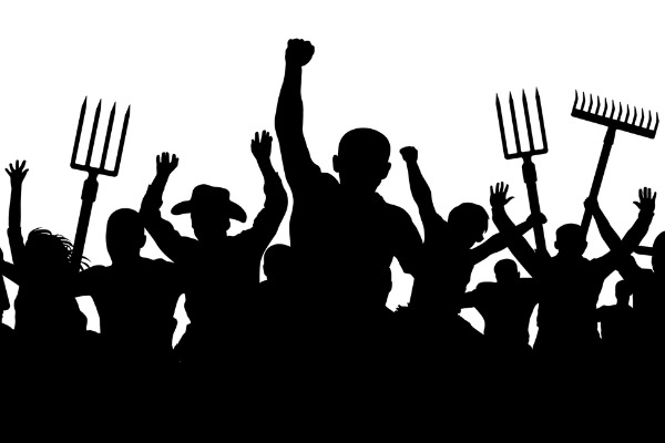 crowd-of-people-with-a-pitchfork-shovel-rake-angry