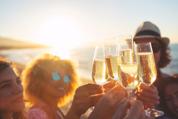 group-of-friends-making-a-champagne-toast-on-the-beach-picture