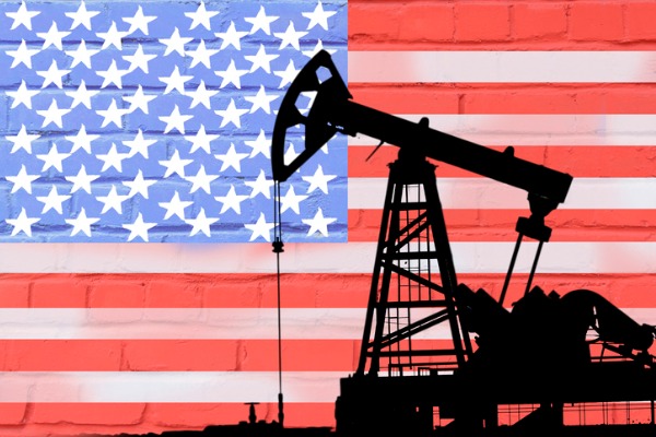 silhouette-of-oil-drilling-pump-on-background-of-united-states-flag