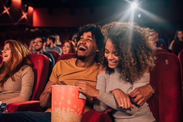 couple-in-love-hugging-at-cinema