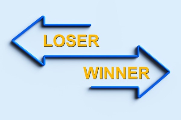 The words loser and winner with arrows. 