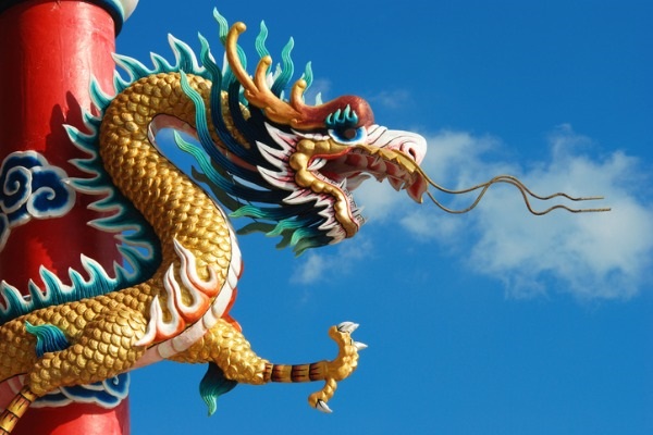 Chinese dragon in front of blue sky picture. 