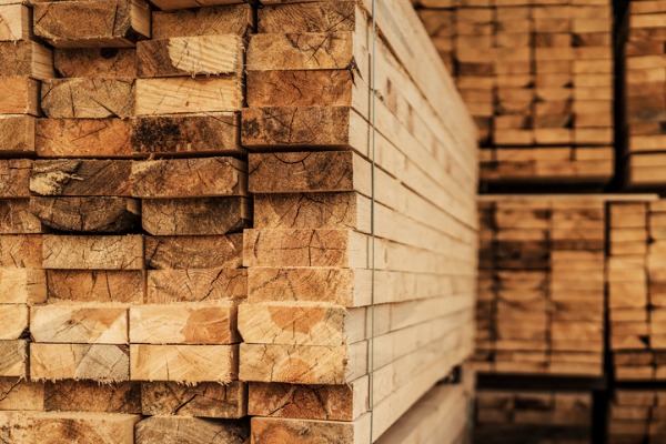 piles-of-wood-planks-in-timber-yard-pictur