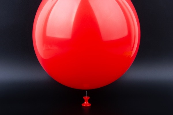 needle-about-to-pop-a-red-balloon