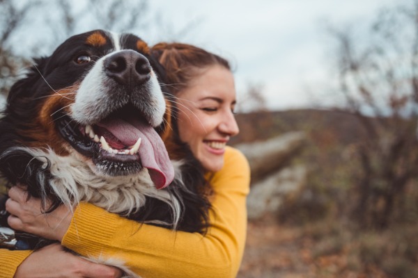 young-woman-with-dog pets 600  