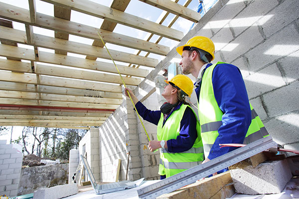 Builders in an unfinished house 600