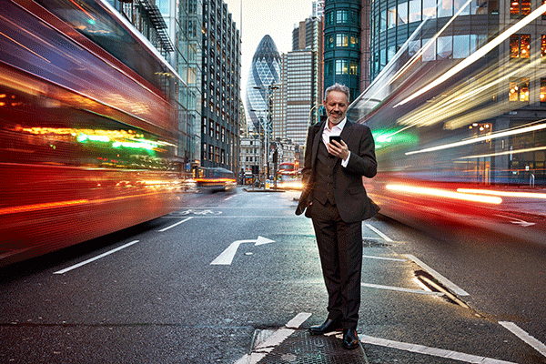 An investor standing in the middle of the road 600