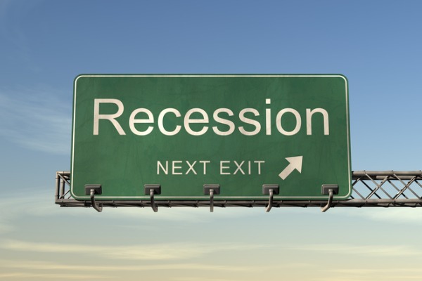 recession next exit road sign 