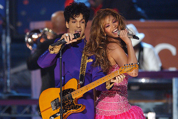 Prince performing on stage 600
