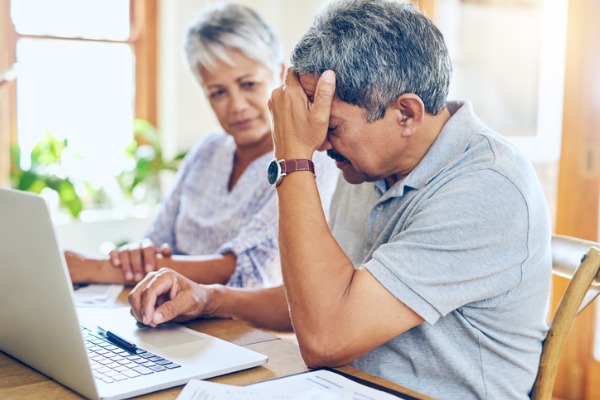 debt retire couple anxious anxiety worry 600