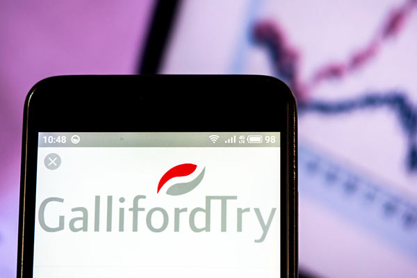 Galliford Try logo against stock market graph 600