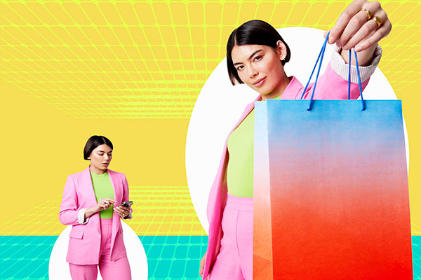 Retail concept with woman holding up shopping bag 600