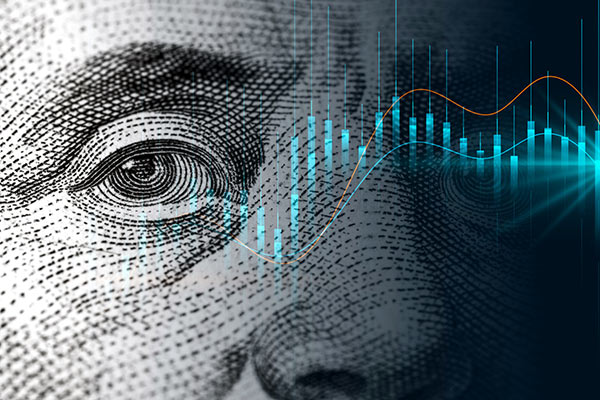 Detail from US dollar note and trading chart montage 600