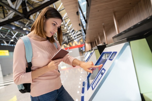 travel tech check-in airport 600