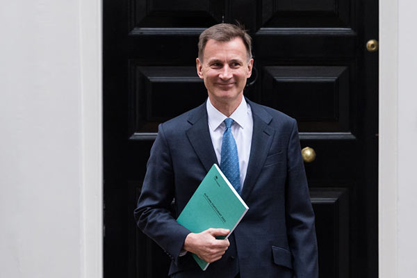 Chancellor Jeremy Hunt at Number 11 with the Autumn Statement, 22 November 2023