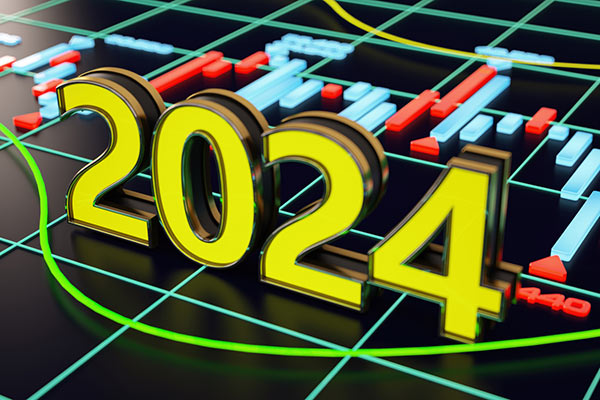 2024 sign against trading screen
