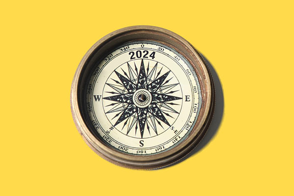 A compass on a yellow background 600