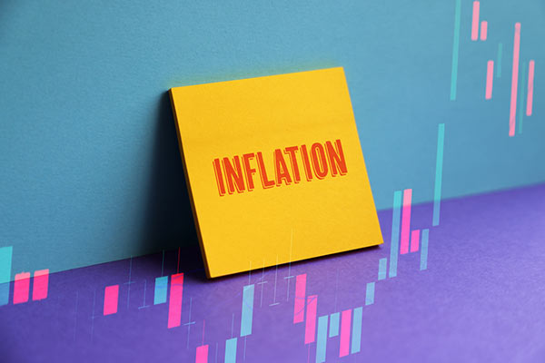 Inflation sign against market graph 600