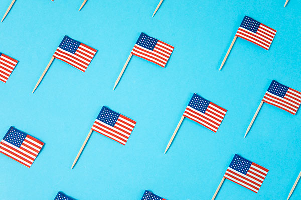 US flags on a turquoise background 600