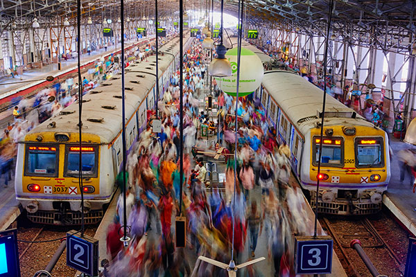 India commuters at a train station 600