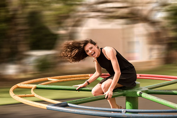 Spinning on a roundabout at the park
