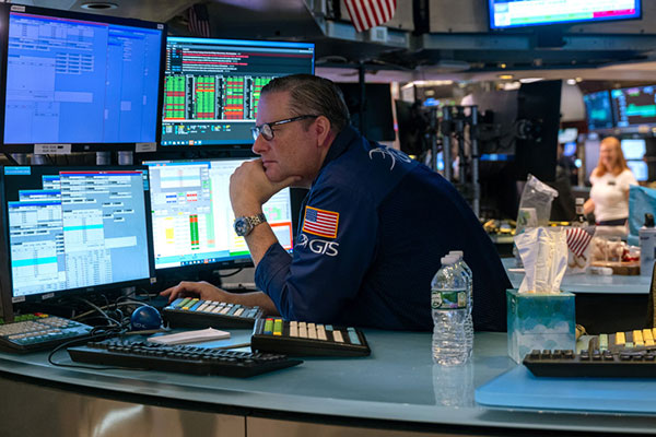 Trader on the floor of the New York Stock Exchange, July 2024, Getty