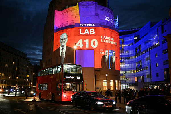 An exit poll predicting Labour win projected on to BBC Broadcasting House on July 4, 2024 Getty