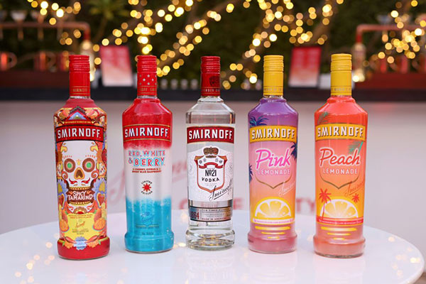 Smirnoff vodka bottles in a row Getty