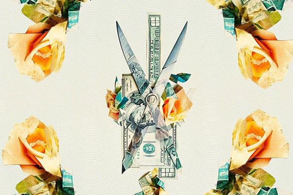 Finimize image of US dollar bills and scissors