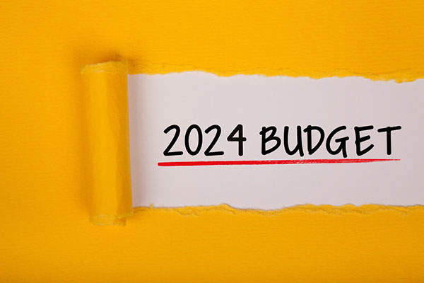 Budget 2024 sign on yellow background