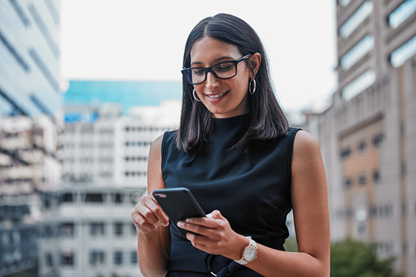 Woman looking at stocks on her smartphone