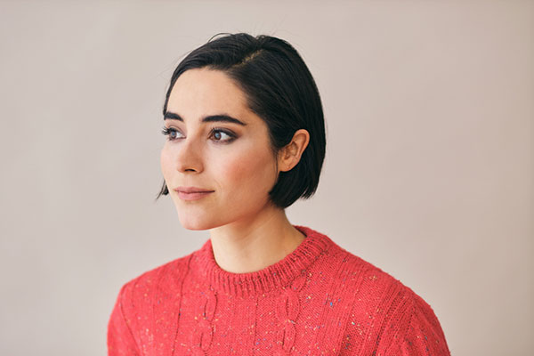 Self-employed woman in red sweater