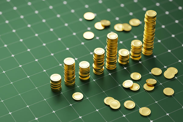 Stock market graph with golden coins on green background 