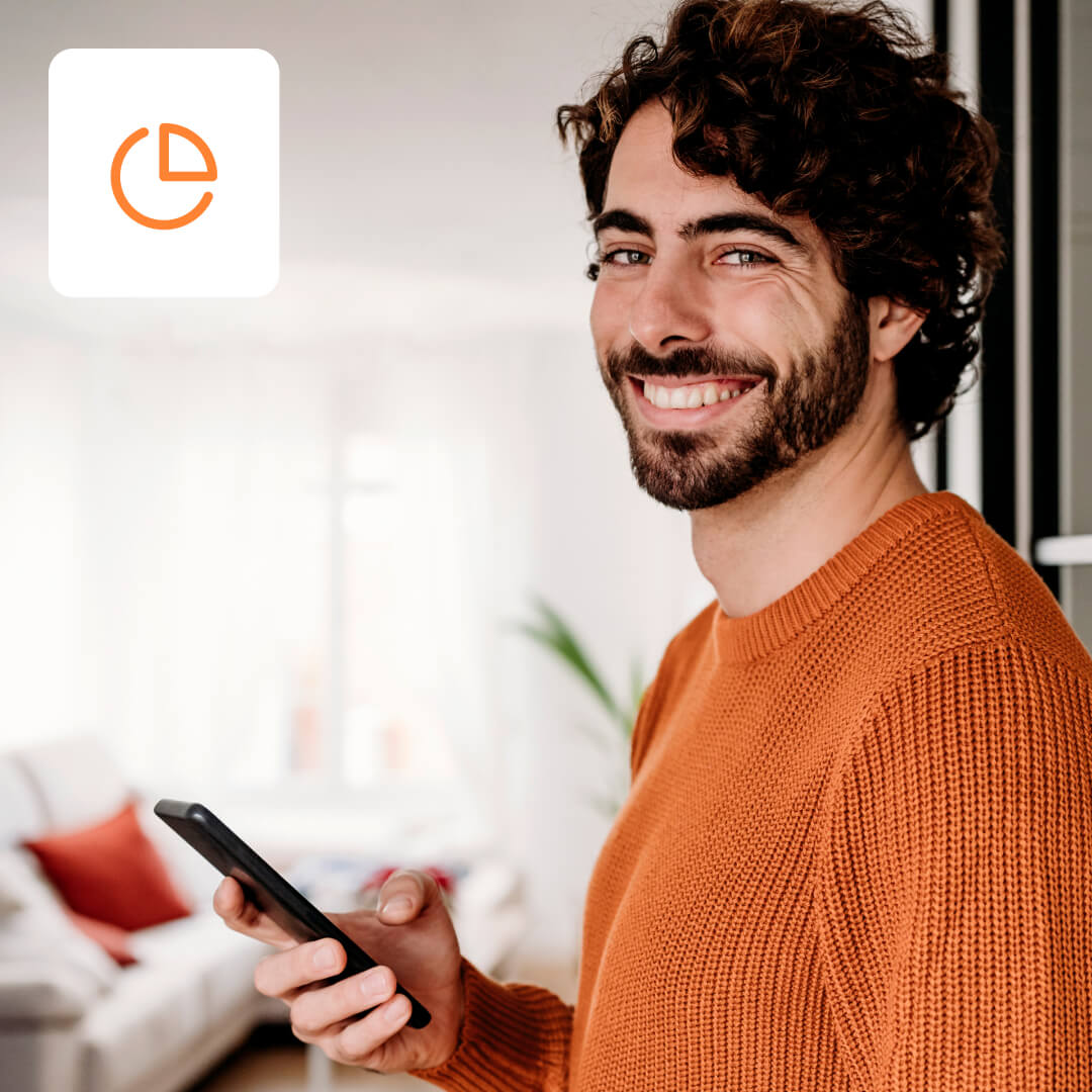 man smiling looking at mobile device trusts icon