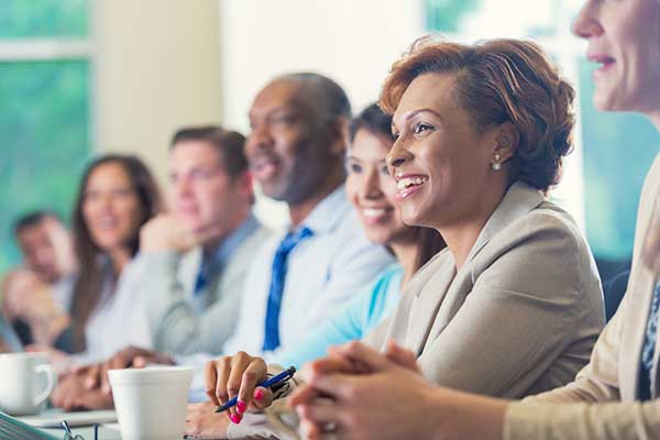 Woman listening during a meeting at an asset manager