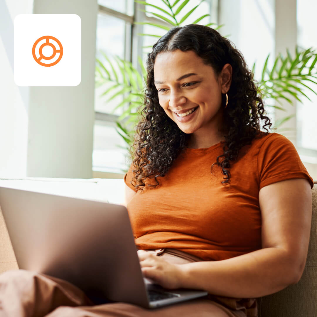 Woman smiling at laptop funds icon