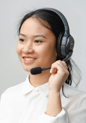 Young woman with telephone support headset.