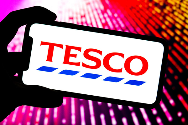 Tesco logo on a smartphone Getty