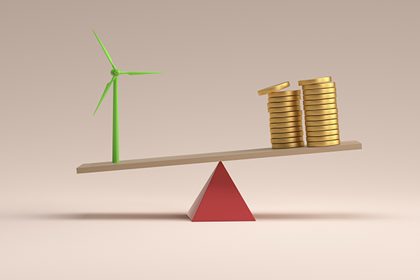 Wind turbine on one side and coins (income) on the other