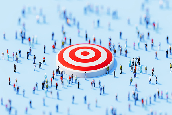 Humans surround a red target on a blue background 