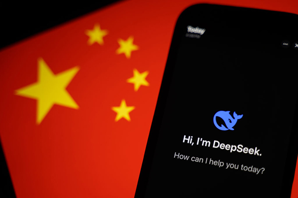 DeepSeek app logo on a phone in front of China flag, Getty