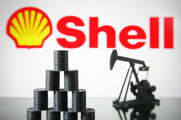 Shell company logo, an oil pump and oil barrels, Getty