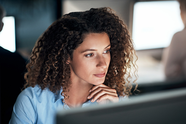 Woman evaluating an investment 