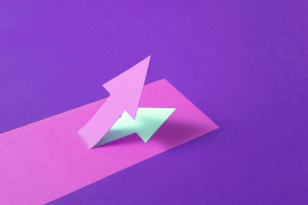 An arrow moving up against a purple background