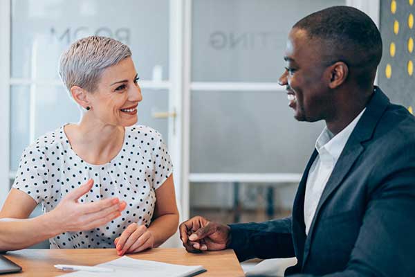 Man and woman employed in financial services